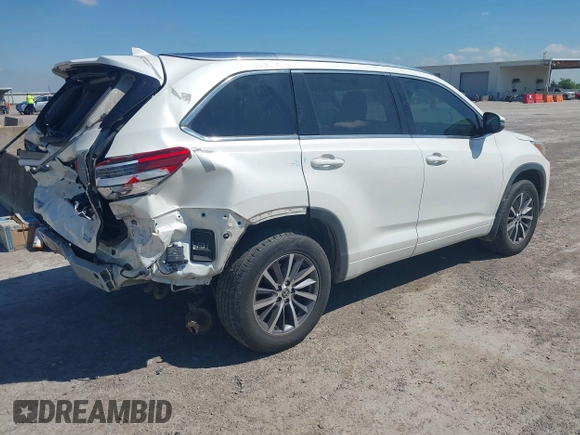 2018 Toyota Highlander SE with VIN 5TDKZRFH8JS548391, listed as a IAAI auction lot 42227742 with 79,782 mi miles and . Bid and sale history available at DreamBid. Image 4.