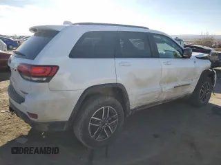2021 Jeep Grand Cherokee Trailhawk with VIN 1C4RJFLG3MC646573, listed as a Copart auction lot 82687014 with 83,294 mi miles and Salvage Title. Bid and sale history available at carsss.com. Image 3.