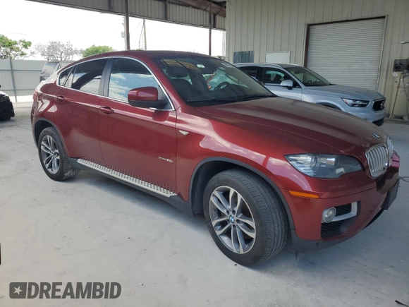 2014 BMW X6 50i z VIN 5UXFG8C58EL592408, wystawiony jako Copart lot #58175225 z przebiegiem 119 939 mil mil oraz Czysty tytuł • Clean title. Historia ofert i sprzedaży dostępna na DreamBid. Obrazek 4.