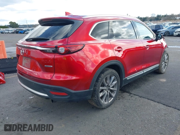 2020 Mazda CX-9 Grand Touring with VIN JM3TCBDY4L0423563, listed as a IAAI auction lot 41829394 with 76,704 mi miles and . Bid and sale history available at DreamBid. Image 4.