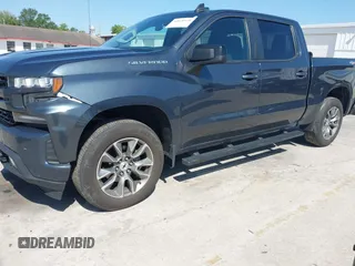 2021 Chevrolet Silverado 1500 RST with VIN 1GCPYEEK3MZ386123, listed as a IAAI auction lot 42020558 with 79,269 mi miles and . Bid and sale history available at DreamBid. Image 2.