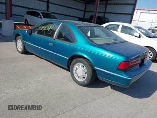 1992 Ford Thunderbird with VIN 1FAPP6049NH155435, listed as a IAAI auction lot 41995083 with 152,615 mi miles and . Bid and sale history available at DreamBid. Image 3.