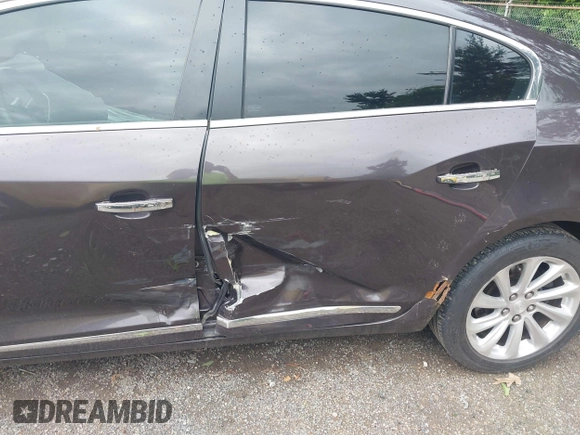 2014 Buick LaCrosse Leather with VIN 1G4GB5G33EF249494, listed as a IAAI auction lot 42538524 with 209,091 mi miles and . Bid and sale history available at DreamBid. Image 6.