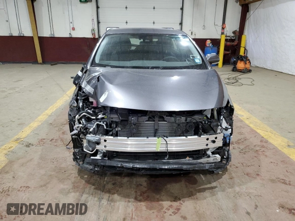 2022 Toyota Prius LE with VIN JTDKAMFP9N3210281, listed as a Copart auction lot 43341595 with 10,502 mi miles and Salvage title. Bid and sale history available at DreamBid. Image 5.