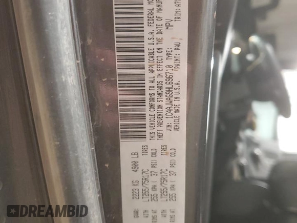 2017 Jeep Wrangler Willys Wheeler with VIN 1C4AJWAG9HL696710, listed as a Copart auction lot 88744905 with 66,800 mi miles and Salvage Title. Bid and sale history available at DreamBid. Image 14.