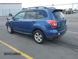 2014 Subaru Forester 2.5i Touring with VIN JF2SJAPC0EH484743, listed as a IAAI auction lot 41955798 with 144,229 mi miles. Bid and sale history available at carsss.com. Image 3.