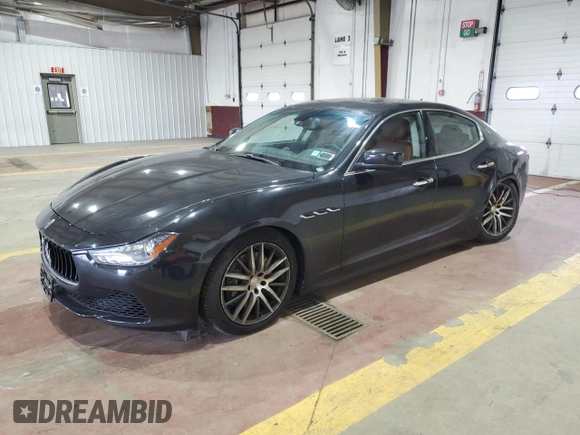 2015 Maserati Ghibli z VIN ZAM57XSA9F1139087, wystawiony jako Copart lot #52235355 z przebiegiem 68 788 mil mil oraz Szkoda całkowita • Salvage title. Historia ofert i sprzedaży dostępna na DreamBid. Obrazek 1.