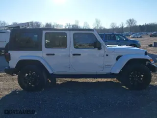 2023 Jeep Wrangler 4xe Sahara with VIN 1C4JJXP61PW684682, listed as a IAAI auction lot 40998281 with 41,138 mi miles. Bid and sale history available at carsss.com. Image 13.