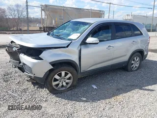 2013 Kia Sorento LX with VIN 5XYKTDA65DG405832, listed as a IAAI auction lot 41811700 with 154,167 mi miles and . Bid and sale history available at DreamBid. Image 2.