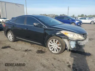 2012 Hyundai Azera with VIN KMHFH4JG0CA168916, listed as a Copart auction lot 53183675 with 227,570 mi miles and Clean Title. Bid and sale history available at carsss.com. Image 4.