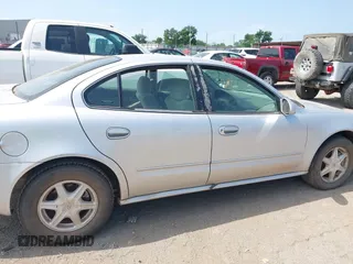 2002 Oldsmobile Alero GL1 z VIN 1G3NL52F32C213795, wystawiony jako IAAI lot #42310950 z przebiegiem Nie podano mil oraz . Historia ofert i sprzedaży dostępna na DreamBid. Obrazek 6.