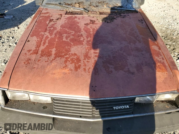 1981 Toyota Celica z VIN JT2RA44C1B0014985, wystawiony jako Copart lot #78658324 z przebiegiem Nie podano mil oraz Czysty tytuł • Clean title. Historia ofert i sprzedaży dostępna na DreamBid. Obrazek 11.