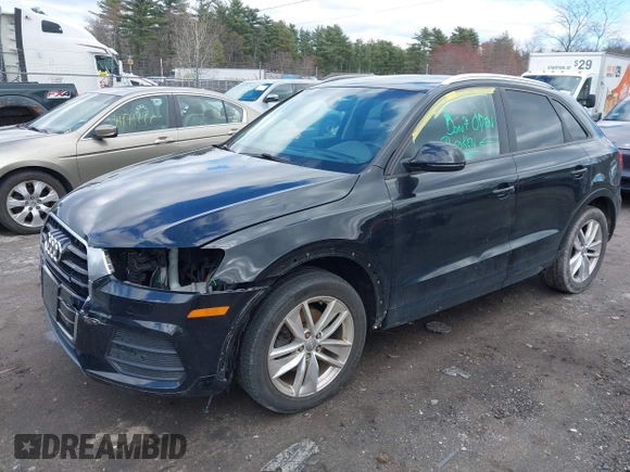 2017 Audi Q3 Premium z VIN WA1ECCFS4HR009874, wystawiony jako IAAI lot #41983904 z przebiegiem 74 785 mil mil oraz . Historia ofert i sprzedaży dostępna na DreamBid. Obrazek 2.