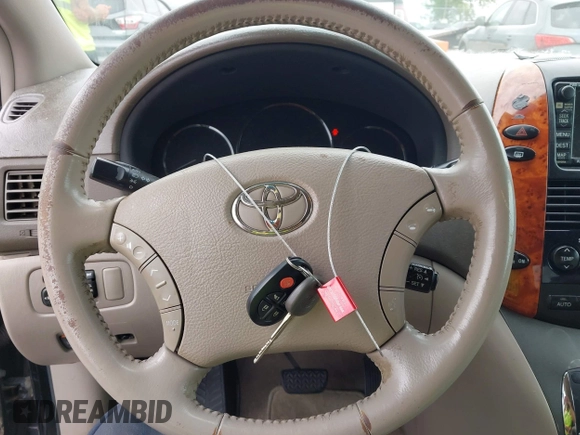 2009 Toyota Sienna XLE with VIN 5TDZK22C49S241302, listed as a IAAI auction lot 42625825 with 220,231 mi miles and . Bid and sale history available at DreamBid. Image 11.