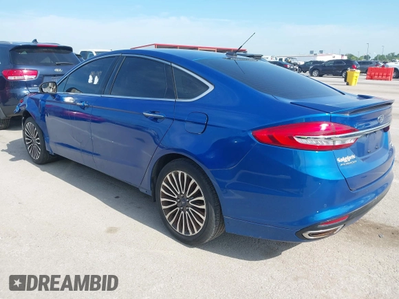 2018 Ford Fusion Titanium with VIN 3FA6P0D92JR205597, listed as a IAAI auction lot 42585935 with 146,072 mi miles and . Bid and sale history available at DreamBid. Image 3.