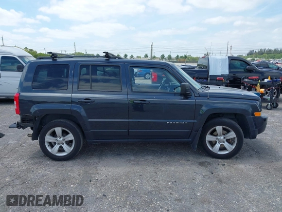 2014 Jeep Patriot Latitude with VIN 1C4NJPFA4ED604145, listed as a IAAI auction lot 42091619 with 81,119 mi miles and . Bid and sale history available at carsss.com. Image 14.