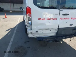 2018 Ford Transit Cargo with VIN 1FTBW3XG8JKA67561, listed as a IAAI auction lot 41997562 with 125,072 mi miles. Bid and sale history available at carsss.com. Image 19.