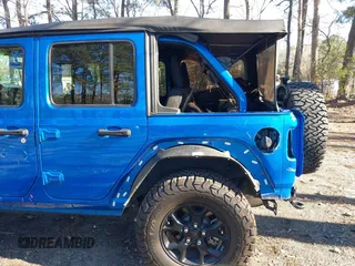 2021 Jeep Wrangler Unlimited Sport S with VIN 1C4HJXDG1MW722743, listed as a IAAI auction lot 41237900 with 35,662 mi miles and . Bid and sale history available at DreamBid. Image 18.