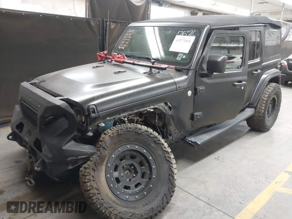 2018 Jeep Wrangler Unlimited Sahara z VIN 1C4HJXEN6JW294774, wystawiony jako IAAI lot #41573606 z przebiegiem 49 325 mil mil oraz . Historia ofert i sprzedaży dostępna na DreamBid. Obrazek 18.