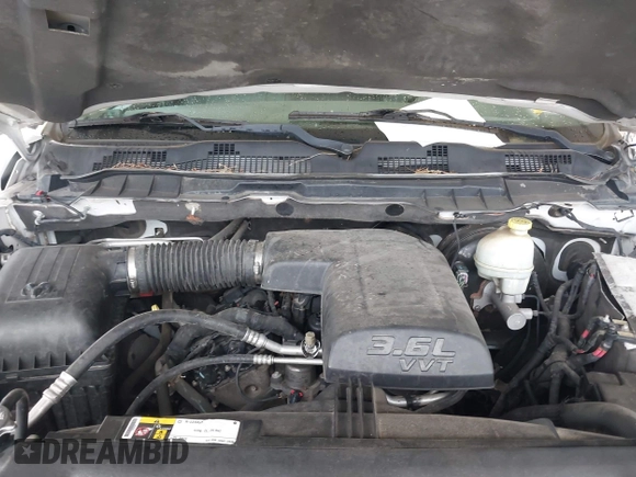 2014 Ram 1500 Tradesman z VIN 1C6RR7FGXES305972, wystawiony jako IAAI lot #42149659 z przebiegiem 163 374 mil mil oraz . Historia ofert i sprzedaży dostępna na DreamBid. Obrazek 10.