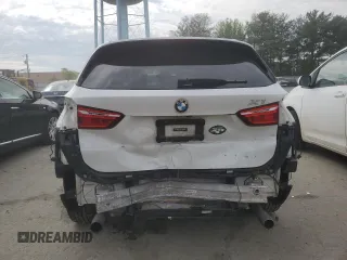 2017 BMW X1 xDrive28i with VIN WBXHT3C32H5F81474, listed as a Copart auction lot 55238895 with 86,264 mi miles and Salvage Title. Bid and sale history available at DreamBid. Image 6.