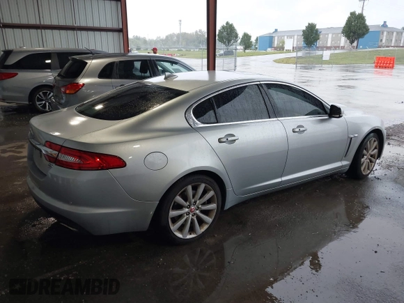 2014 Jaguar XF V6 SC with VIN SAJWJ0EF9E8U17227, listed as a IAAI auction lot 40455665 with 125,196 mi miles. Bid and sale history available at carsss.com. Image 4.