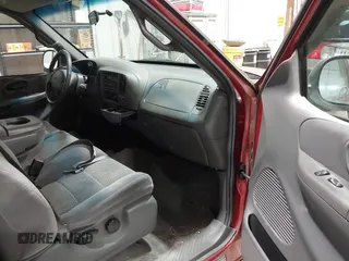2002 Ford F-150 XL with VIN 1FTRX17L12NA36715, listed as a IAAI auction lot 41850555 with 174,012 mi miles. Bid and sale history available at carsss.com. Image 5.