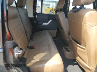 2012 Jeep Wrangler Unlimited Sahara with VIN 1C4HJWEG5CL205826, listed as a Copart auction lot 58222115 with 98,940 mi miles and Salvage title. Bid and sale history available at DreamBid. Image 11.