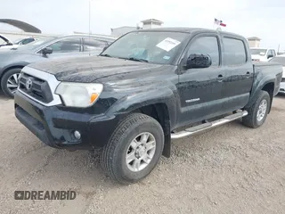 2014 Toyota Tacoma PreRunner with VIN 3TMJU4GN9EM157662, listed as a IAAI auction lot 41952359 with 109,002 mi miles and . Bid and sale history available at DreamBid. Image 17.