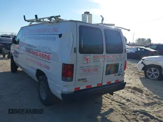 2013 Ford Econoline Cargo Commercial with VIN 1FTNE1EW4DDA35701, listed as a IAAI auction lot 41900327 with 226,733 mi miles and . Bid and sale history available at carsss.com. Image 6.