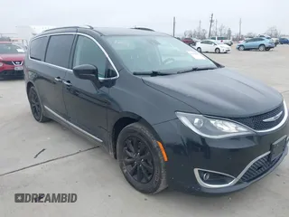 2018 Chrysler Pacifica Touring L Plus z VIN 2C4RC1EG3JR352443, wystawiony jako IAAI lot #41433947 z przebiegiem 276 457 mil mil oraz . Historia ofert i sprzedaży dostępna na DreamBid. Obrazek 1.