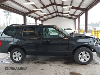 2003 Ford Explorer XLS z VIN 1FMZU62K33UB97283, wystawiony jako IAAI lot #41657337 z przebiegiem Nie podano mil oraz . Historia ofert i sprzedaży dostępna na DreamBid. Obrazek 13.