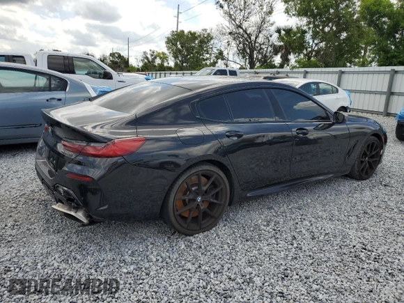 2020 BMW 8 Series M850i z VIN WBAGV8C06LBP48901, wystawiony jako Copart lot #57595725 z przebiegiem 88 332 mil mil oraz Czysty tytuł • Clean title. Historia ofert i sprzedaży dostępna na DreamBid. Obrazek 3.