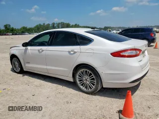 2014 Ford Fusion SE Hybrid with VIN 3FA6P0LU1ER110489, listed as a Copart auction lot 58364095 with 112,605 mi miles and Salvage title. Bid and sale history available at DreamBid. Image 2.