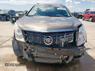 2014 Cadillac SRX Premium Collection with VIN 3GYFNDE33ES567108, listed as a Copart auction lot 55970265 with 97,720 mi miles and Salvage title. Bid and sale history available at DreamBid. Image 5.