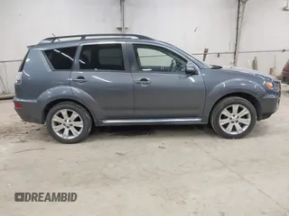 2011 Mitsubishi Outlander SE z VIN JA4JT3AWXBU007978, wystawiony jako IAAI lot #42337365 z przebiegiem 239 587 mil mil oraz . Historia ofert i sprzedaży dostępna na DreamBid. Obrazek 13.