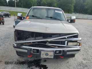 2000 Chevrolet Tahoe Z71 with VIN 1GNEK13R7YR189177, listed as a Copart auction lot 56830725 with 308,270 mi miles and Salvage title. Bid and sale history available at DreamBid. Image 5.