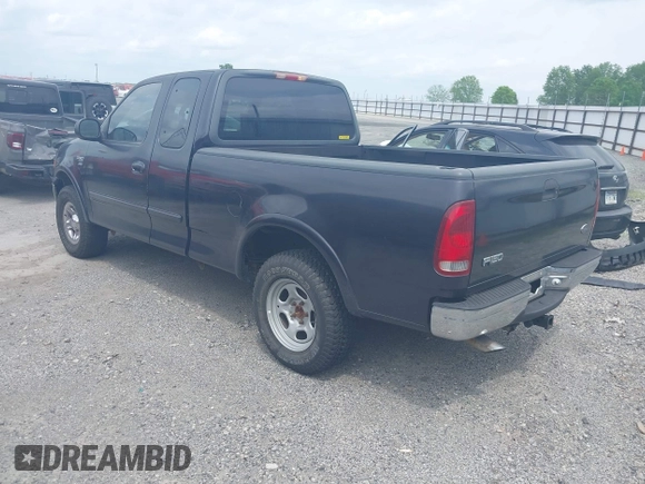1999 Ford F-150 XL with VIN 1FTRX18L3XNA05021, listed as a IAAI auction lot 42138727 with 1 mi miles. Bid and sale history available at carsss.com. Image 3.