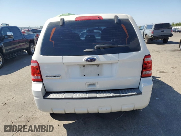 2012 Ford Escape XLS z VIN 1FMCU0C76CKB12316, wystawiony jako Copart lot #65011265 z przebiegiem 139 992 mil mil oraz Szkoda całkowita • Salvage title. Historia ofert i sprzedaży dostępna na DreamBid. Obrazek 6.