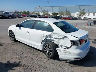 2017 Volkswagen Jetta SE with VIN 3VWDB7AJ9HM384202, listed as a IAAI auction lot 42543807 with 92,914 mi miles and . Bid and sale history available at DreamBid. Image 3.