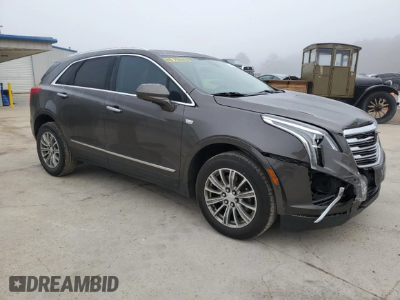 2019 Cadillac XT5 Luxury FWD with VIN 1GYKNCRSXKZ141831, listed as a Copart auction lot 43758765 with 97,402 mi miles and Salvage Title. Bid and sale history available at DreamBid. Image 4.