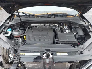 2021 Volkswagen Tiguan S z VIN 3VV0B7AX3MM031908, wystawiony jako IAAI lot #42504384 z przebiegiem 42 510 mil mil oraz . Historia ofert i sprzedaży dostępna na DreamBid. Obrazek 10.