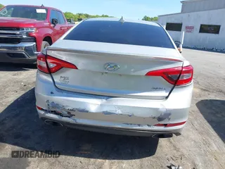 2015 Hyundai Sonata Sport with VIN 5NPE34AF6FH256579, listed as a IAAI auction lot 42052813 with 103,988 mi miles and . Bid and sale history available at DreamBid. Image 6.