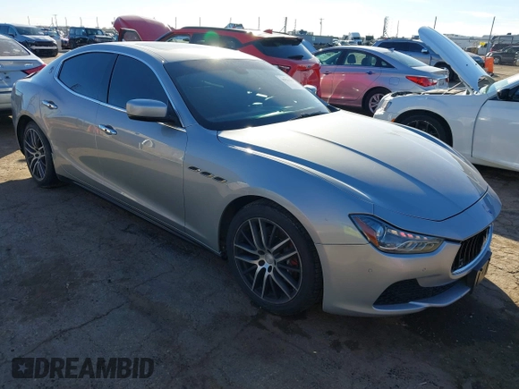 2015 Maserati Ghibli z VIN ZAM57XSA7F1135961, wystawiony jako IAAI lot #40831583 z przebiegiem 89 671 mil mil oraz . Historia ofert i sprzedaży dostępna na DreamBid. Obrazek 1.