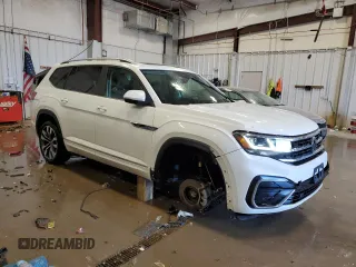 2021 Volkswagen Atlas SEL R-Line with VIN 1V2SR2CA9MC556499, listed as a Copart auction lot 44033995 with 55,061 mi miles and Salvage title. Bid and sale history available at DreamBid. Image 4.