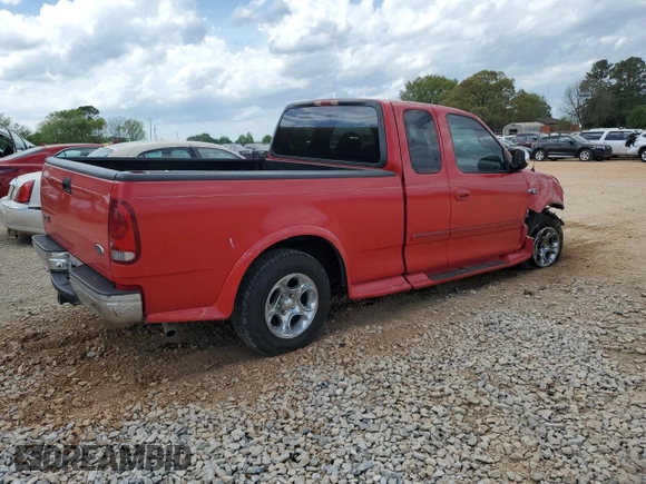 1999 Ford F-150 with VIN 1FTZX1725XNA33332, listed as a Copart auction lot 51867455 with 163,023 mi miles and Salvage title. Bid and sale history available at DreamBid. Image 3.