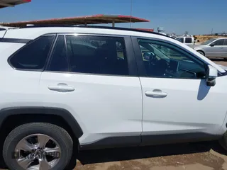2025 Toyota RAV4 XLE with VIN 2T3W1RFV8SW374059, listed as a IAAI auction lot 42121740 with 7,228 mi miles. Bid and sale history available at carsss.com. Image 13.