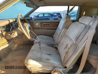 1985 Cadillac Eldorado z VIN 1G6EL5781FE647818, wystawiony jako Copart lot #77608224 z przebiegiem 7192 mil mil oraz Tytuł czysty. Historia ofert i sprzedaży dostępna na DreamBid. Obrazek 7.