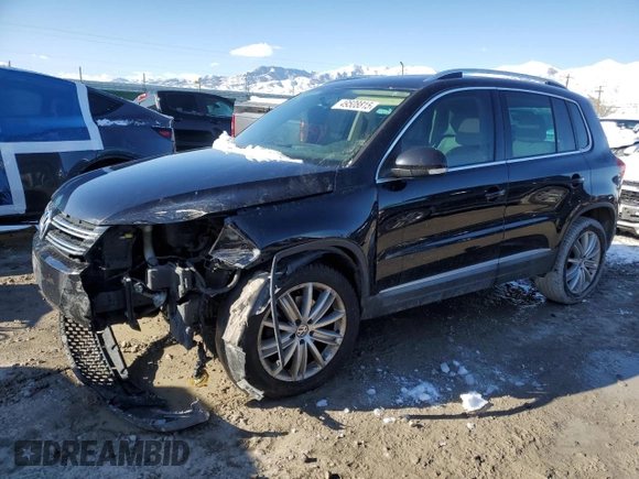 2015 Volkswagen Tiguan SE z VIN WVGBV7AX9FW516731, wystawiony jako Copart lot #49508815 z przebiegiem 172 072 mil mil oraz Szkoda całkowita • Salvage title. Historia ofert i sprzedaży dostępna na DreamBid. Obrazek 1.