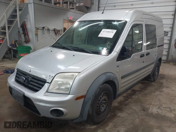 2013 Ford Transit Connect XLT with VIN NM0LS6BN1DT167813, listed as a IAAI auction lot 42768038 with 284,915 mi miles and . Bid and sale history available at DreamBid. Image 2.